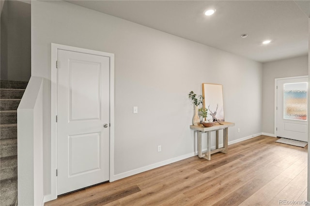 entryway with light hardwood / wood-style floors