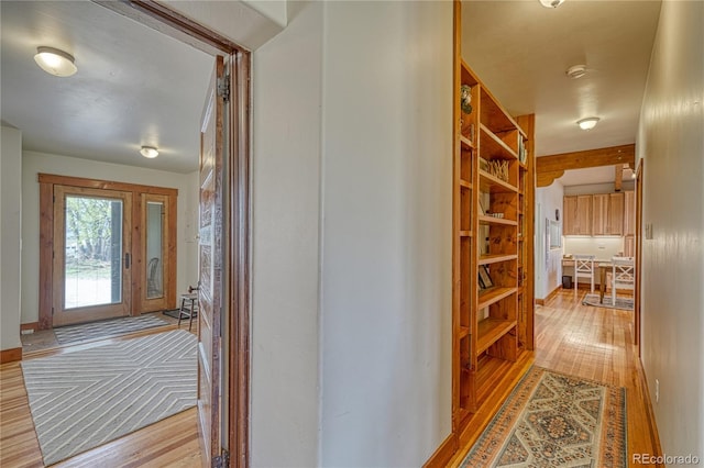 hallway featuring light hardwood / wood-style flooring