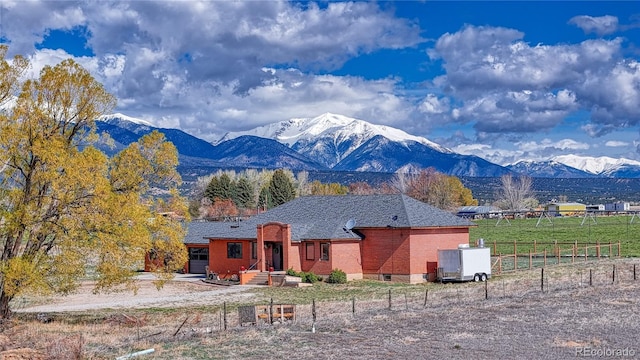 view of mountain feature featuring a rural view