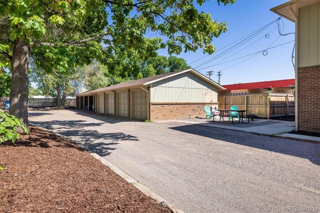 view of property exterior featuring an outbuilding