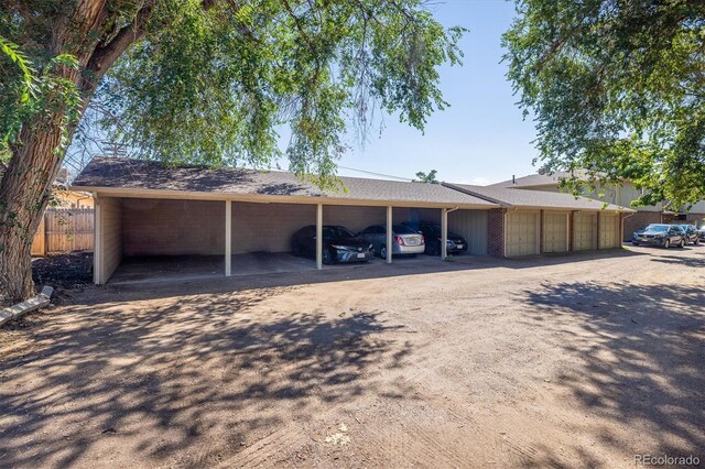 view of front of home featuring a carport