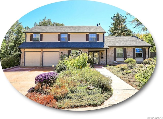 view of front of property with a garage