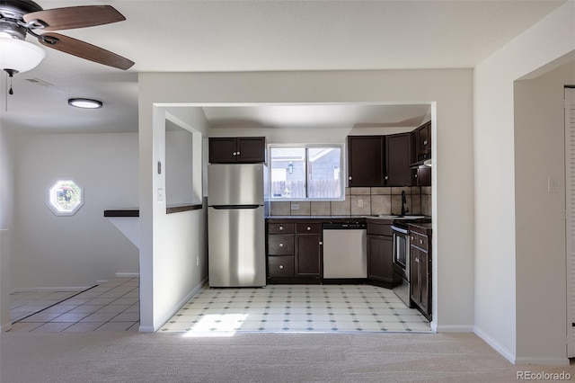 3570 Center Ave, Denver, CO 80219 - kitchen featuring appliances with stainless steel finishes, dark brown cabinets, ceiling fan, decorative backsplash, and light colored carpet