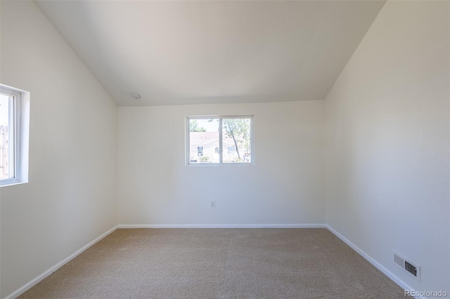 3570 Center Ave, Denver, CO 80219 - empty room with lofted ceiling and carpet
