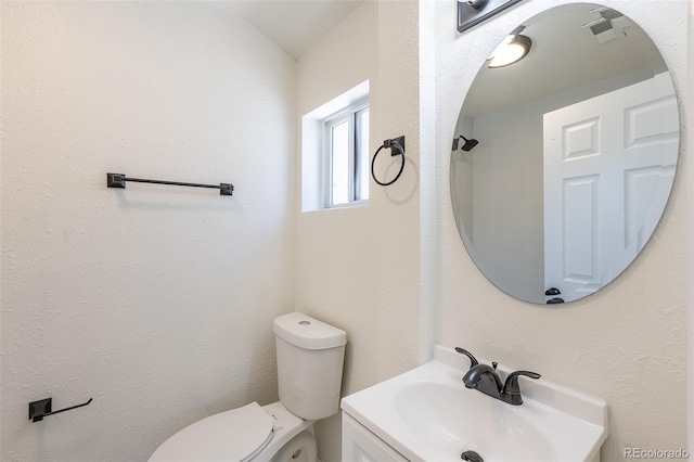 3570 Center Ave, Denver, CO 80219 - bathroom with toilet and vanity