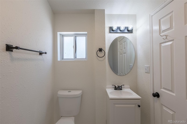 3570 Center Ave, Denver, CO 80219 - half bathroom featuring toilet and vanity