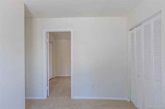 3570 Center Ave, Denver, CO 80219 - unfurnished bedroom featuring light carpet and baseboards