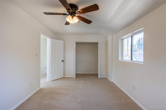 3570 Center Ave, Denver, CO 80219 - unfurnished bedroom featuring light colored carpet, ceiling fan, and a closet