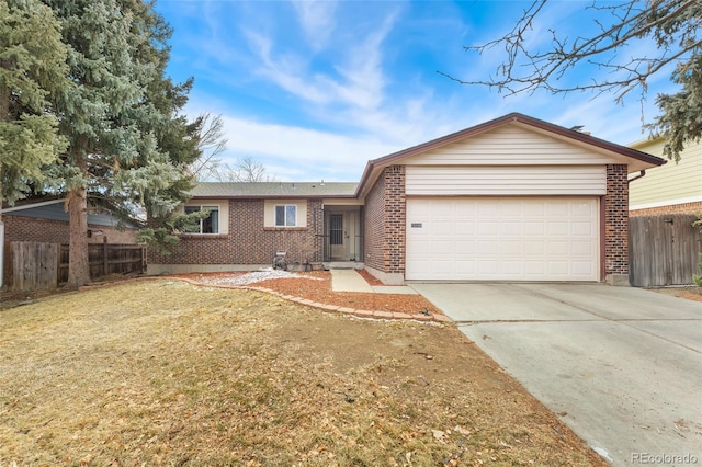 ranch-style home with a garage and a front yard