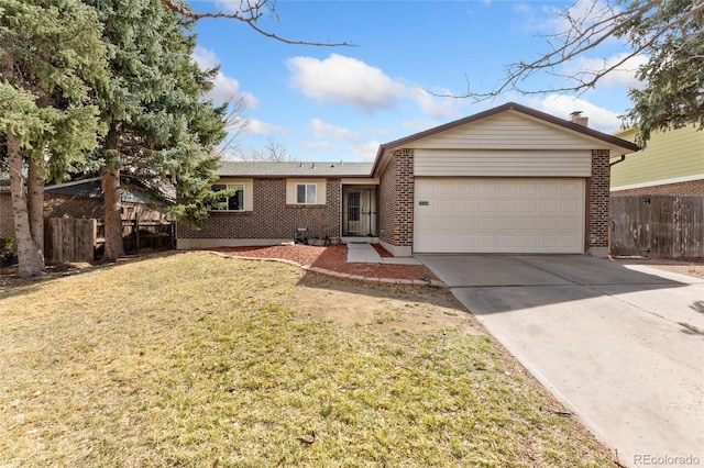 15104 E Utah Pl, Aurora, CO 80012 - ranch-style home featuring a front lawn, fence, brick siding, concrete driveway, and an attached garage
