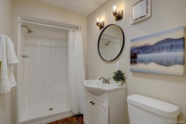 9288 Krashin Dr, Conifer, CO 80433 - full bath with curtained shower, vanity, and toilet