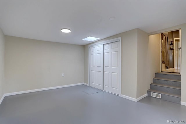 9288 Krashin Dr, Conifer, CO 80433 - below grade area with baseboards and stairway
