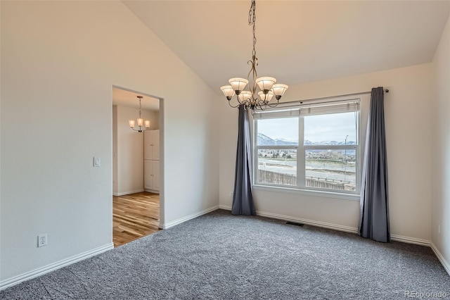 16645 W 2nd Ave, Golden, CO 80401 - spare room with a chandelier, carpet floors, and lofted ceiling