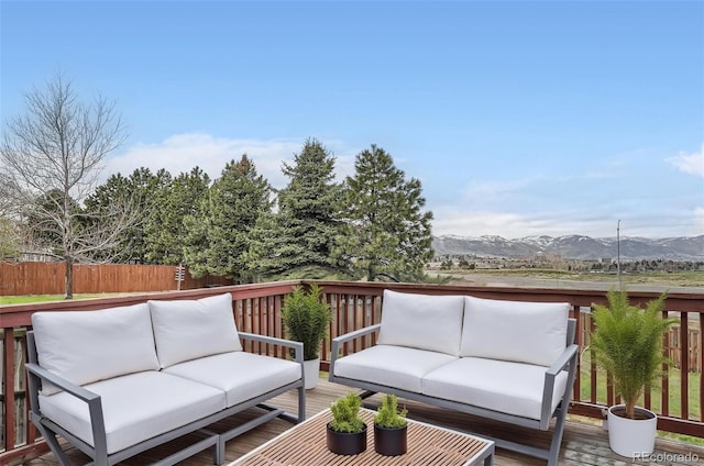 16645 W 2nd Ave, Golden, CO 80401 - wooden deck with an outdoor hangout area and a mountain view