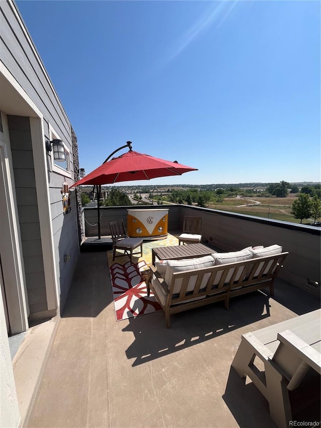 view of patio / terrace featuring a balcony and an outdoor hangout area