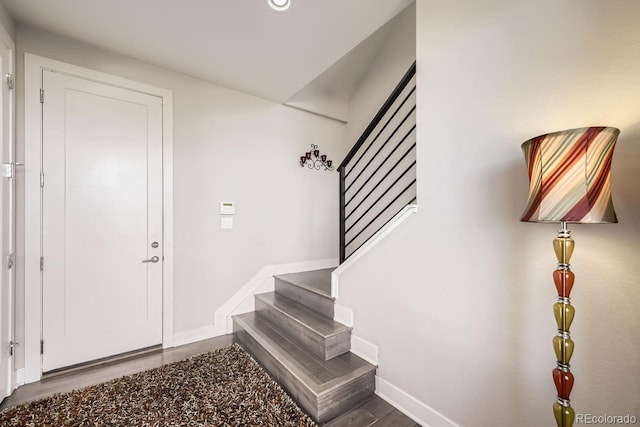 15878 E Broncos Pl, Englewood, CO 80112 - foyer entrance with wood finished floors, stairs, baseboards, and recessed lighting