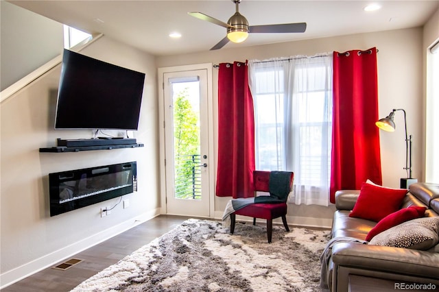 15878 E Broncos Pl, Englewood, CO 80112 - living area featuring ceiling fan, baseboards, wood finished floors, and recessed lighting