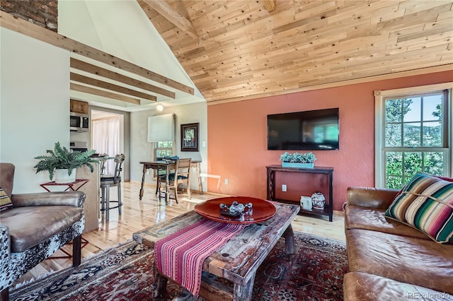 903 High Rd, Manitou Springs, CO 80829 - living room featuring light wood finished floors, a wood ceiling with exposed beams, and high vaulted ceiling