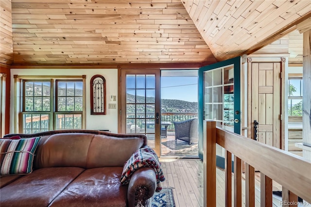 903 High Rd, Manitou Springs, CO 80829 - living area featuring vaulted ceiling, wood ceiling, healthy amount of natural light, hardwood / wood-style flooring, and french doors