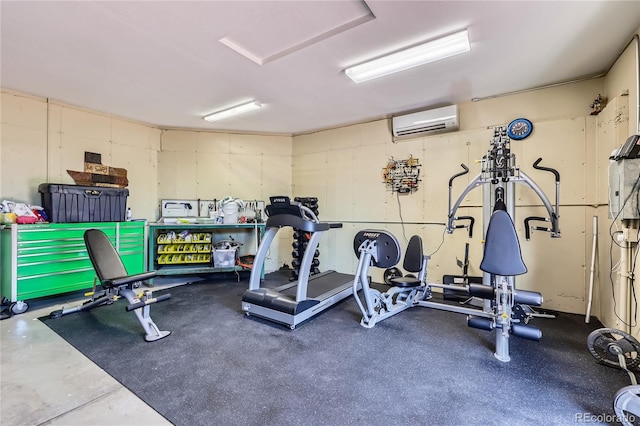 903 High Rd, Manitou Springs, CO 80829 - workout room featuring a wall mounted air conditioner