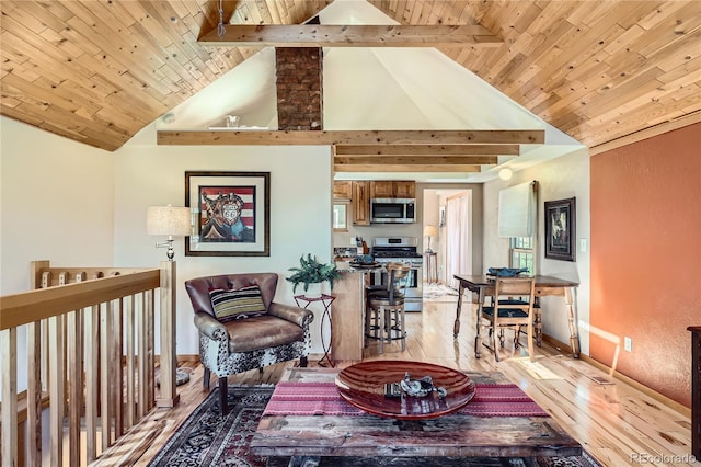 903 High Rd, Manitou Springs, CO 80829 - living room featuring light wood finished floors, a wooden ceiling with exposed beams, and high vaulted ceiling