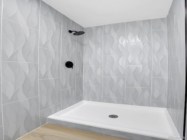 8694 E Eastman Ave, Denver, CO 80231 - bathroom with tiled shower