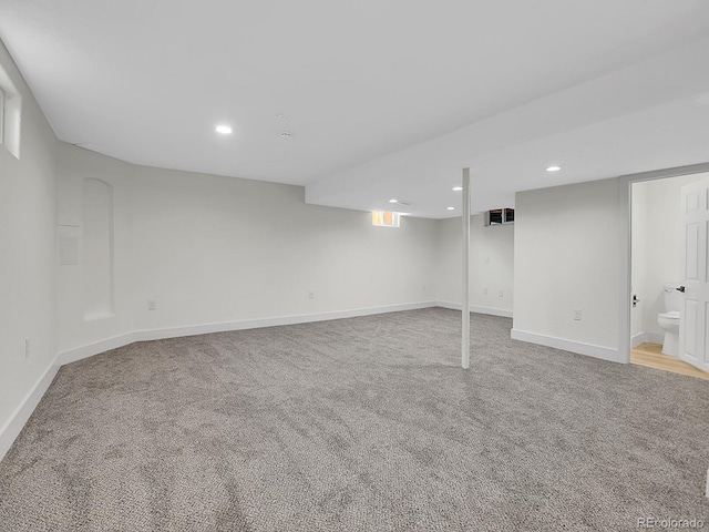 8694 E Eastman Ave, Denver, CO 80231 - finished basement featuring recessed lighting, light colored carpet, and baseboards