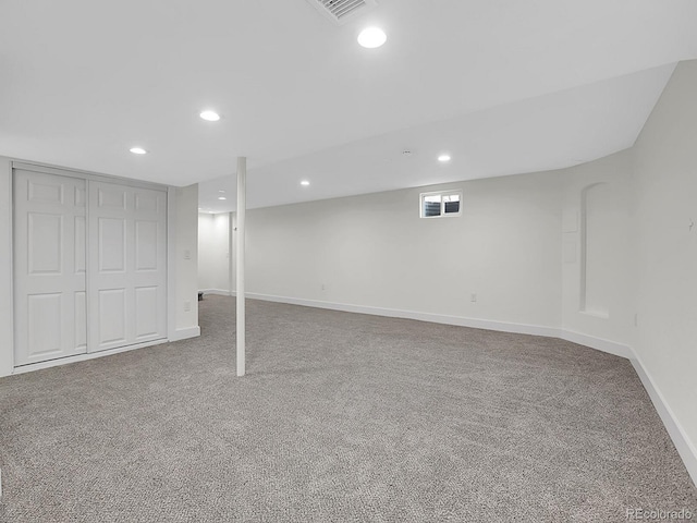 8694 E Eastman Ave, Denver, CO 80231 - finished below grade area with carpet floors, baseboards, and recessed lighting