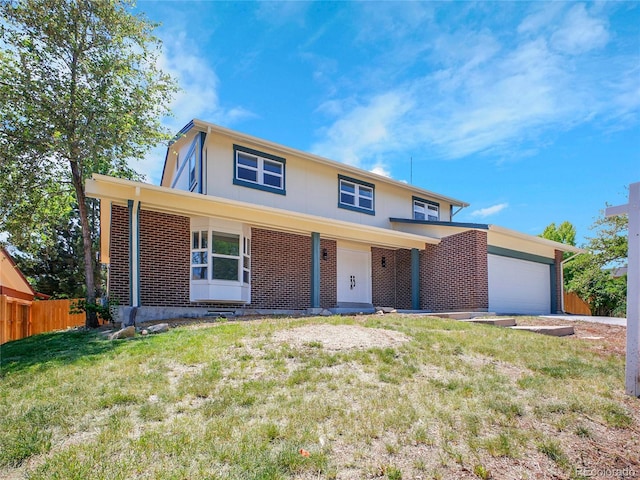 8694 E Eastman Ave, Denver, CO 80231 - traditional home with an attached garage and brick siding