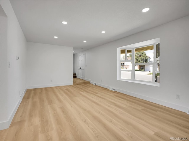 8694 E Eastman Ave, Denver, CO 80231 - empty room with recessed lighting and light wood-style flooring