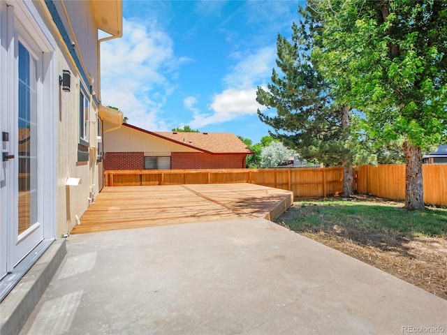 8694 E Eastman Ave, Denver, CO 80231 - fenced backyard with a patio
