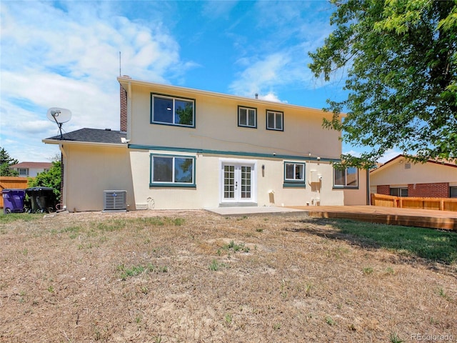8694 E Eastman Ave, Denver, CO 80231 - rear view of house with french doors and stucco siding