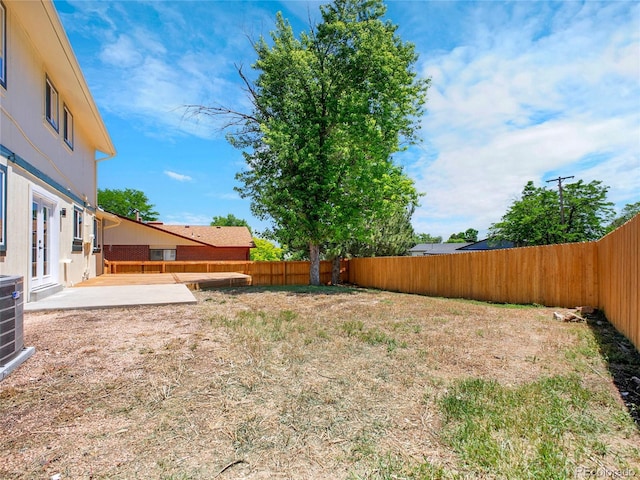 8694 E Eastman Ave, Denver, CO 80231 - fenced backyard with a patio and french doors
