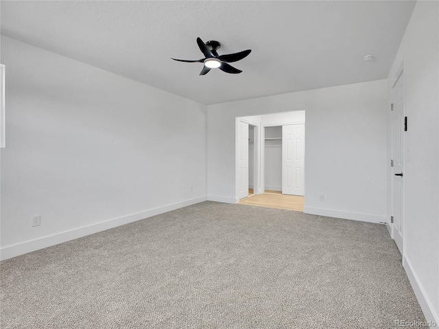 8694 E Eastman Ave, Denver, CO 80231 - unfurnished bedroom with light carpet, ceiling fan, and a closet