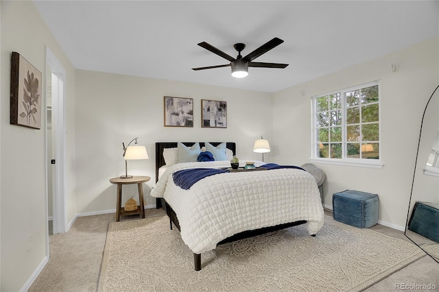 1717 Tulip St, Longmont, CO 80501 - carpeted bedroom with baseboards and a ceiling fan