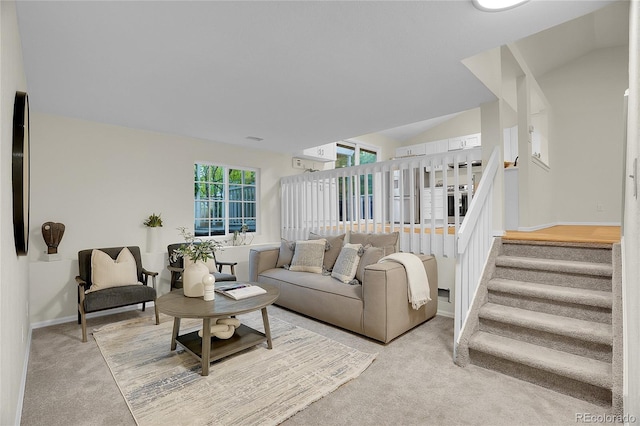 1717 Tulip St, Longmont, CO 80501 - living room with light carpet, stairway, and vaulted ceiling