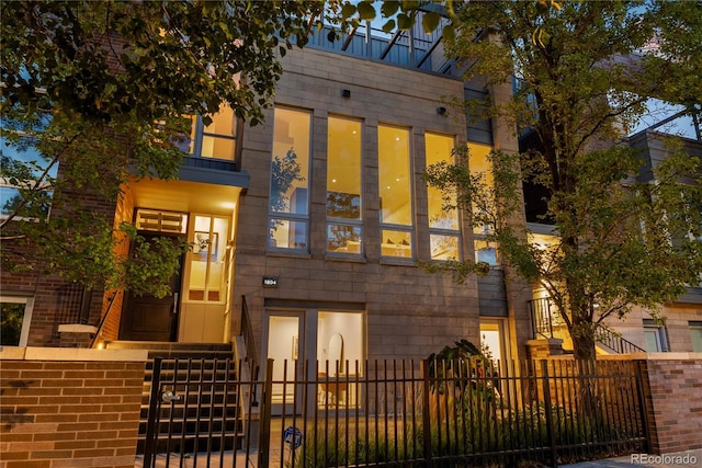 1804 Little Raven St, Denver, CO 80202 - contemporary house featuring a fenced front yard and a gate
