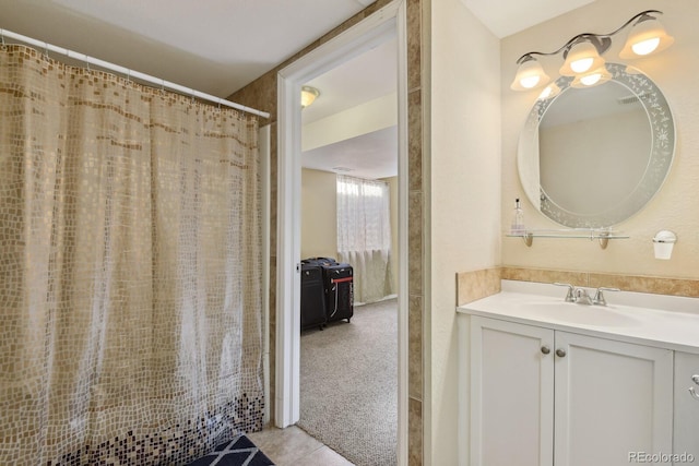 bathroom featuring tile patterned floors and vanity