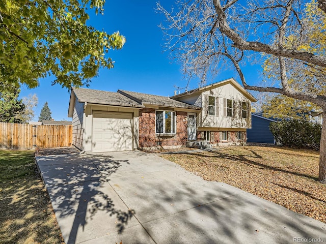 tri-level home featuring a garage