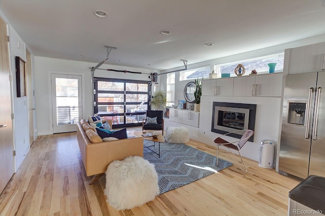 living area with light wood-type flooring