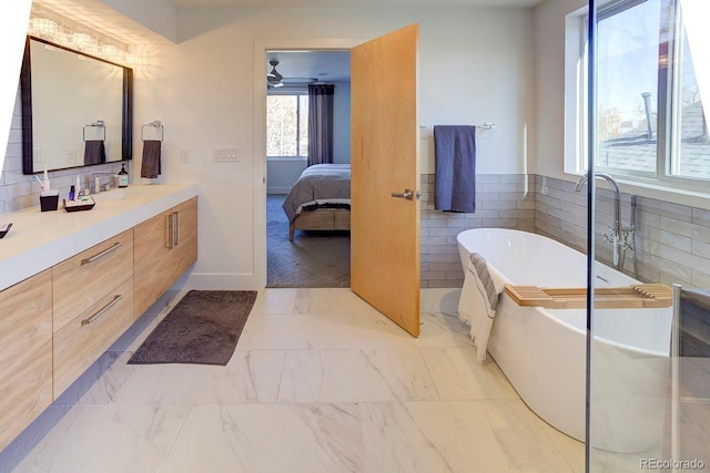 bathroom featuring a bathtub and vanity