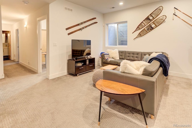 living room featuring light carpet