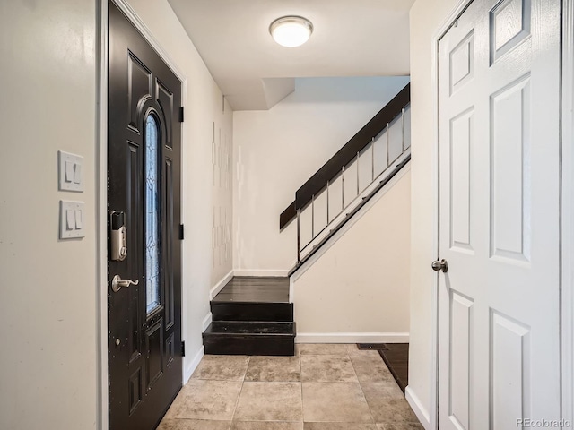 7520 Braun Ct, Arvada, CO 80005 - entryway with stairs and baseboards
