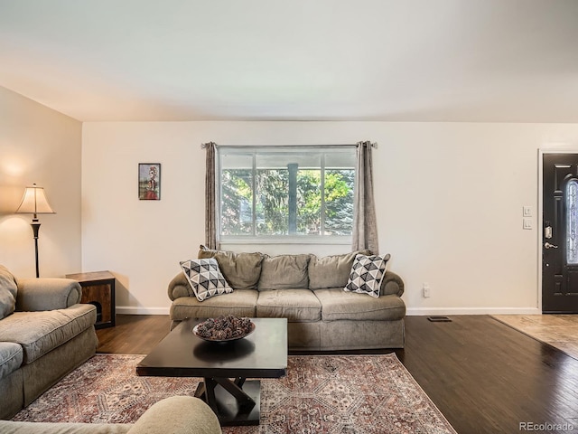 7520 Braun Ct, Arvada, CO 80005 - living area with wood finished floors and baseboards