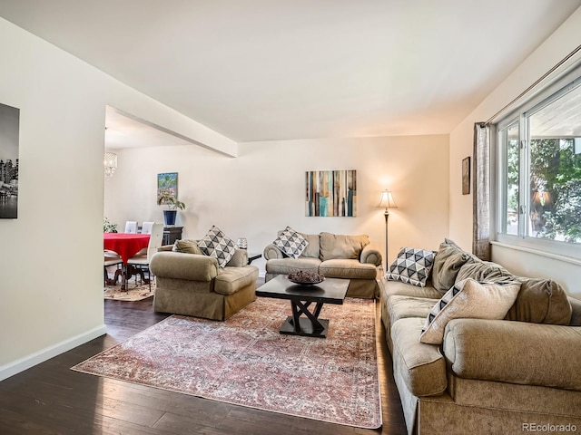 7520 Braun Ct, Arvada, CO 80005 - living room featuring hardwood / wood-style flooring and a chandelier