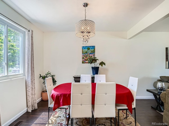 7520 Braun Ct, Arvada, CO 80005 - dining space featuring a chandelier and dark wood-type flooring