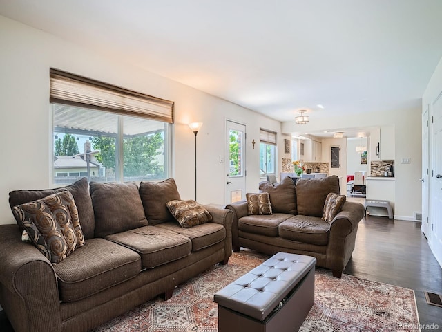 7520 Braun Ct, Arvada, CO 80005 - living area featuring wood finished floors