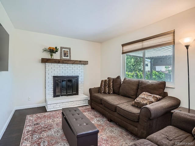 7520 Braun Ct, Arvada, CO 80005 - living room featuring wood finished floors and a brick fireplace
