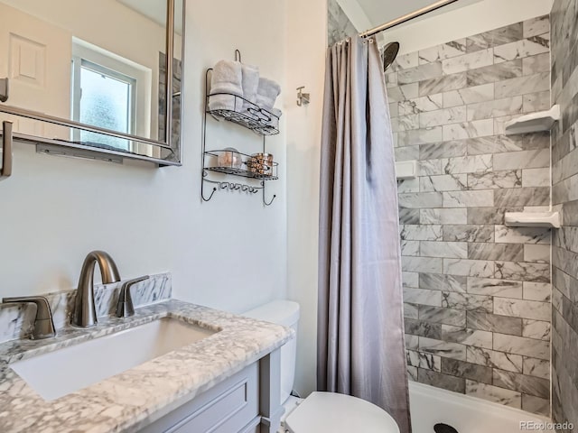 7520 Braun Ct, Arvada, CO 80005 - bathroom with vanity and tiled shower