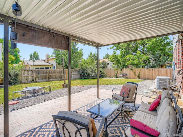 7520 Braun Ct, Arvada, CO 80005 - fenced backyard with a patio and outdoor lounge area